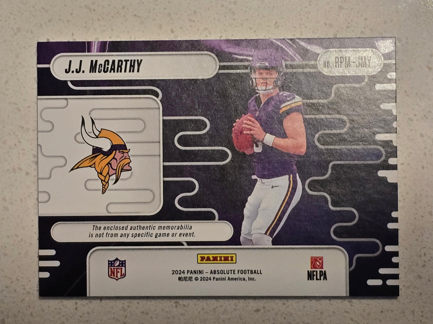 J.J. McCarthy 2024 Panini Absolute Rookie Premiere Triple Memorabilia Card