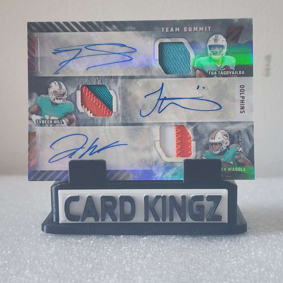 2022 Tua Tagovailoa, Tyreek Hill, Jaylen Waddle Triple Auto Jersey Card /15 PSA 9 Miami Dolphins