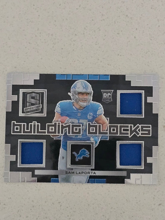 Sam LaPorta 2023 Spectra RC – Triple Patch “Building Blocks” #/99 – Lions